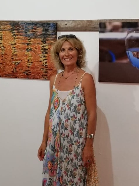 Susimagin setting up her work during an exhibition